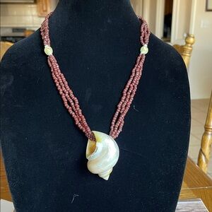 Elegant Brown Beaded Necklace with Shell Pendant